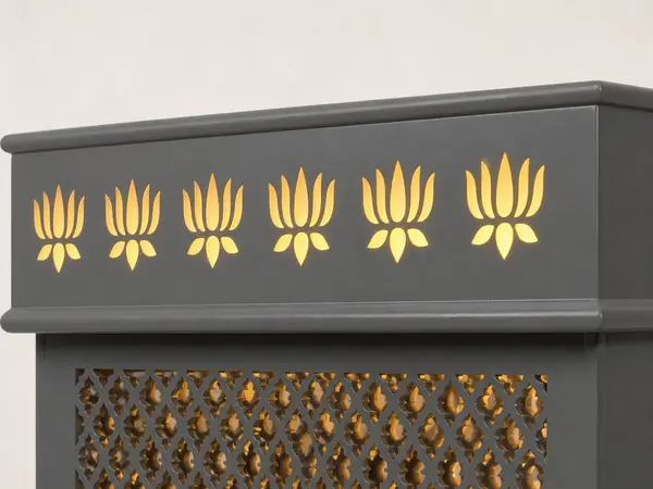 Close-up of the hexagonal Om medallion and gold lotus cornice