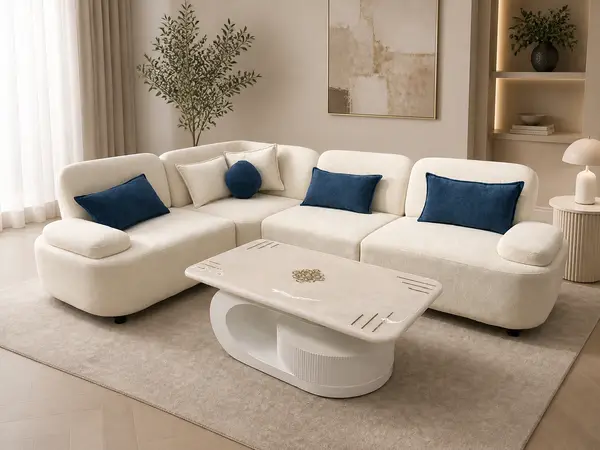 Cream boucle sofa with navy accents styled in a living room setting
