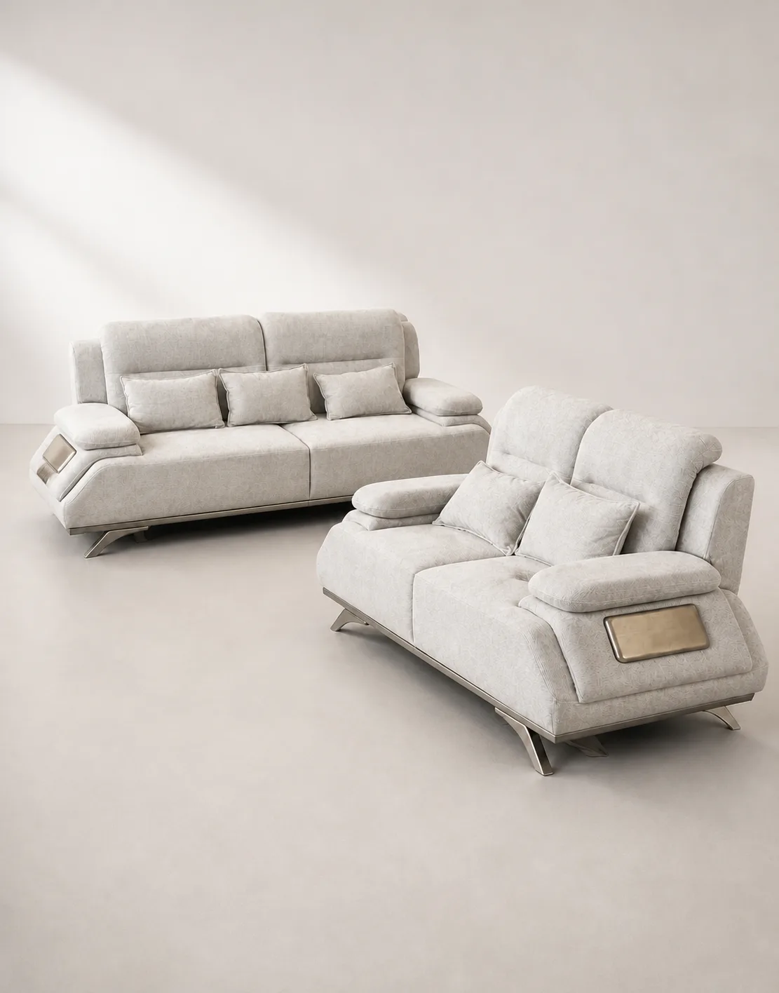 Light grey and silver 3+2 sofa set in a styled living room