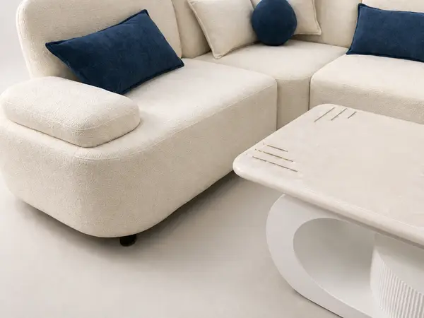 Close-up of the boucle texture and navy accent cushion