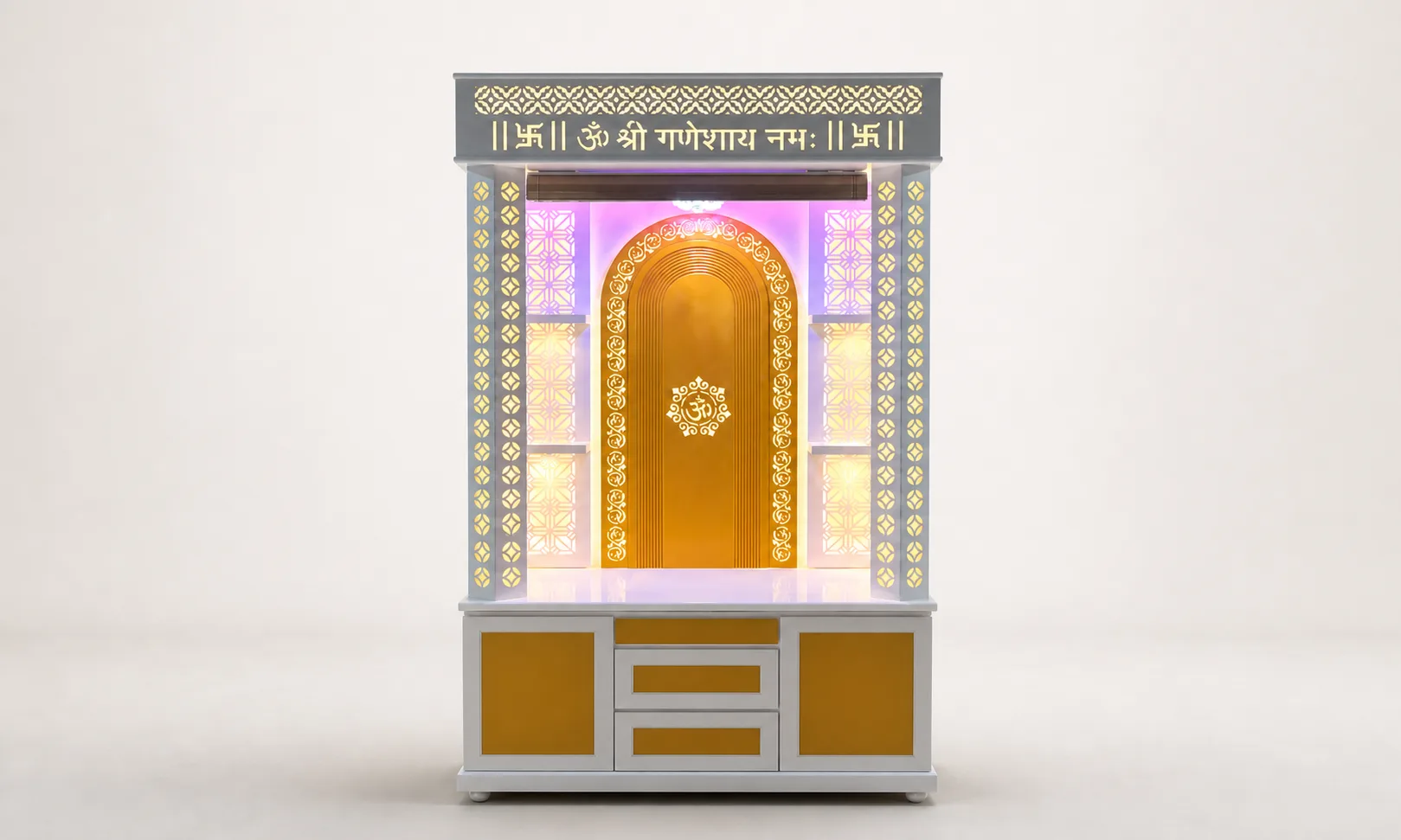 Mandir unit with gold-amber arch niche, purple accent lighting and a carved Om Shri Ganeshaya Namah header.