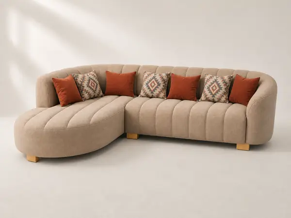 Taupe channel-tufted curved L-sofa, three-quarter angle