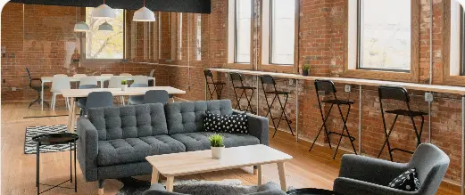 Open-plan living and dining space with sofa and dining table